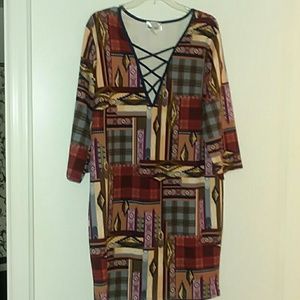 A cute short dress with a unique print.